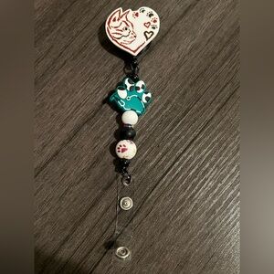 Cat badge reel